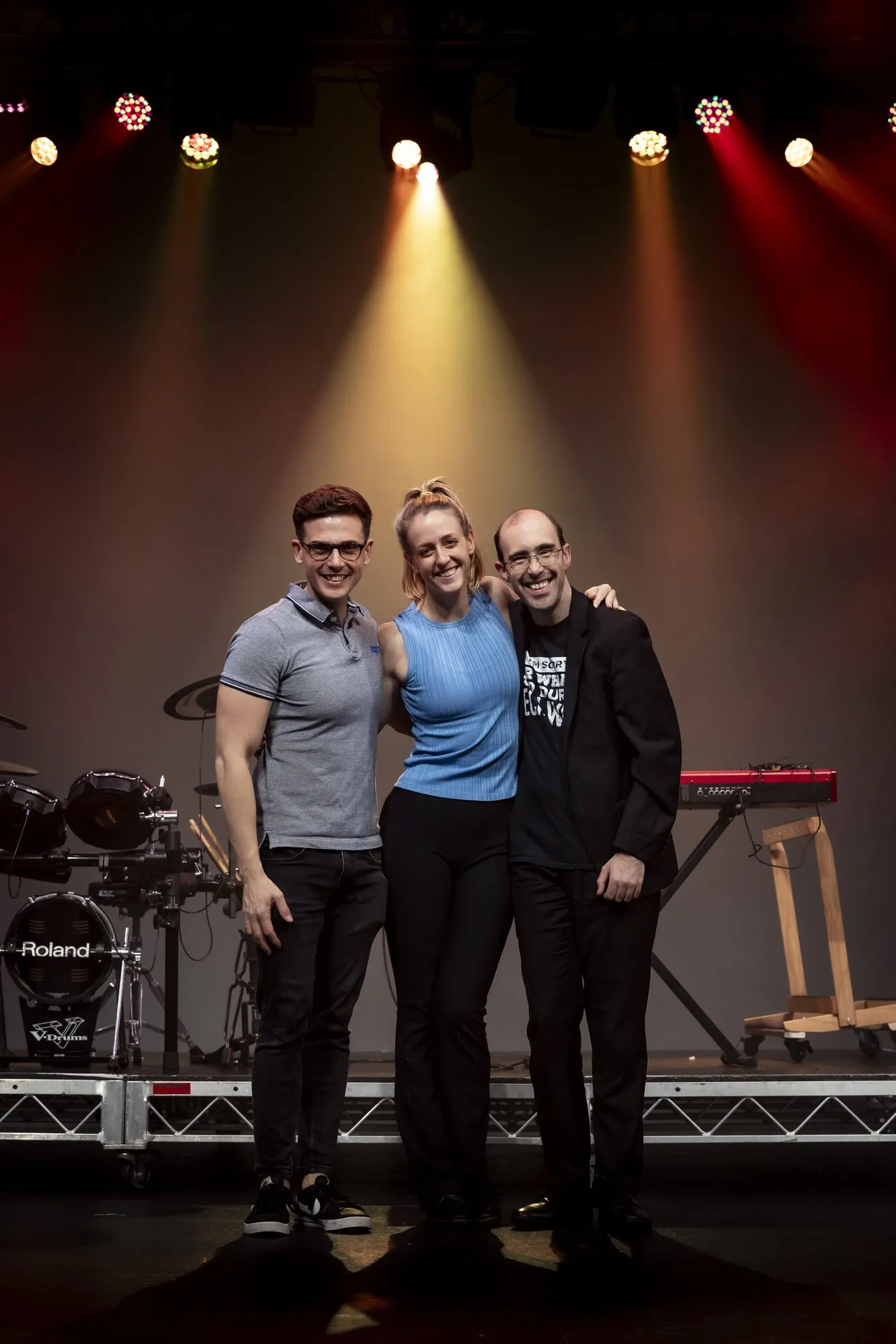 An SYMT production team takes the stage